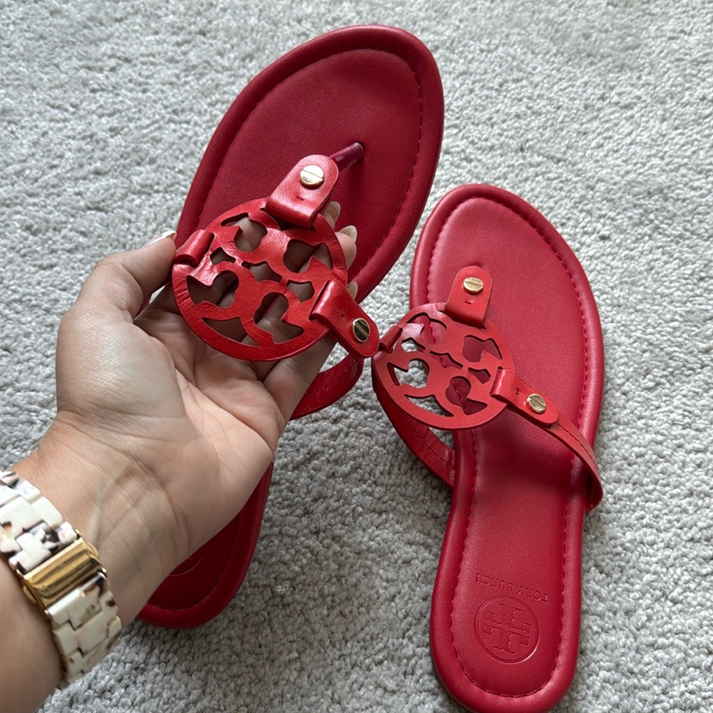 Never worn Tory Burch flip-flops size 11